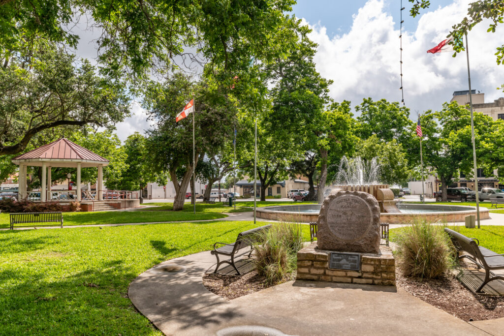 Central Park in Seguin - Public park with benches and fountain.